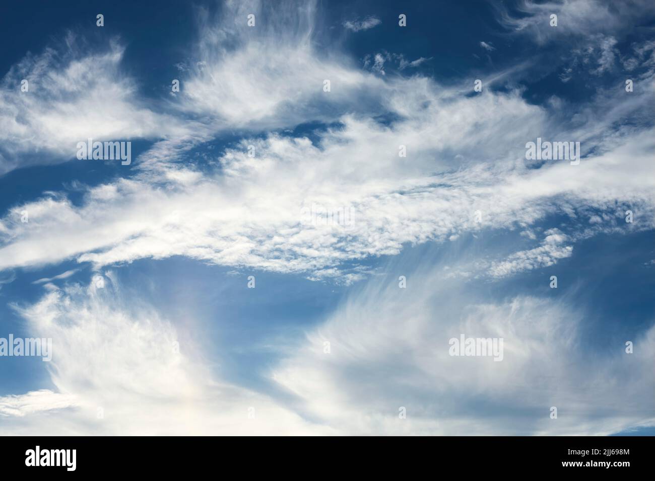 Blue sky with clouds, natural background. Stock Photo
