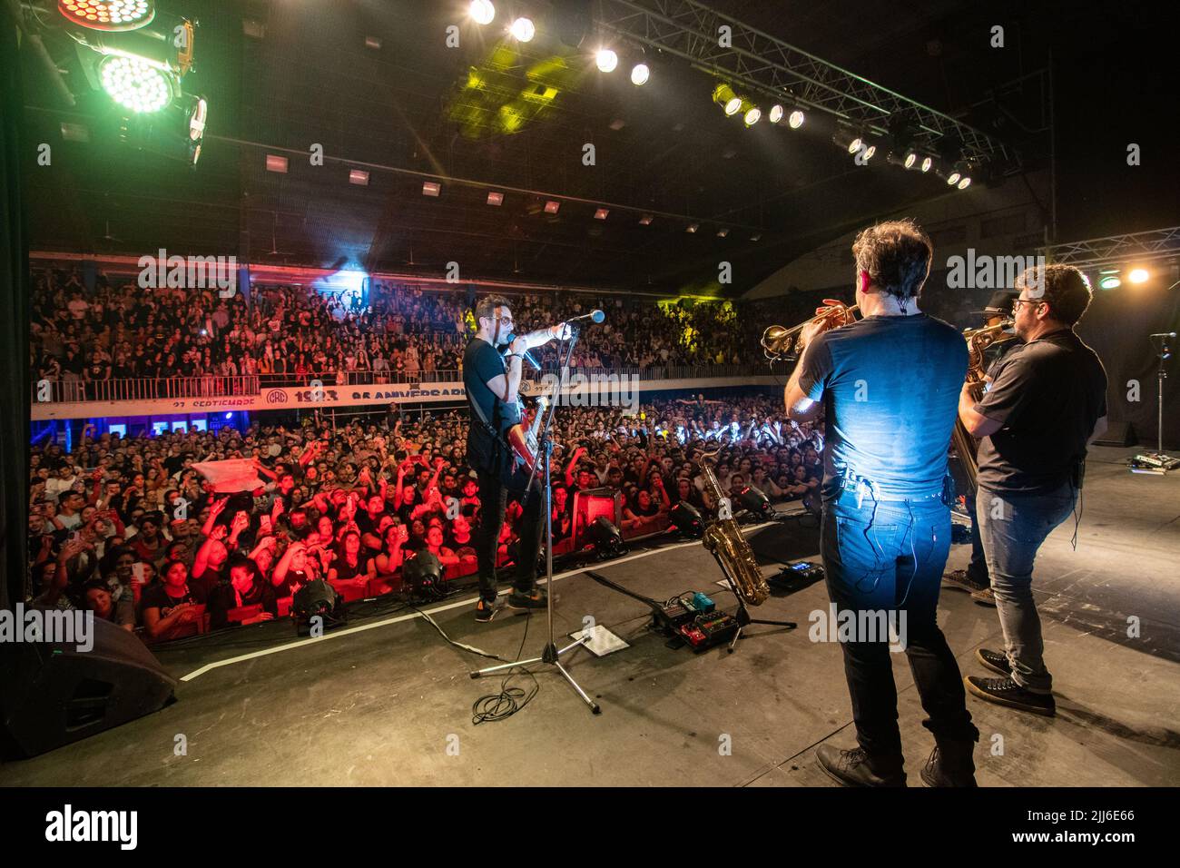 'No te va a gustar' performs for their crowd during a concert in Argentina. Stock Photo