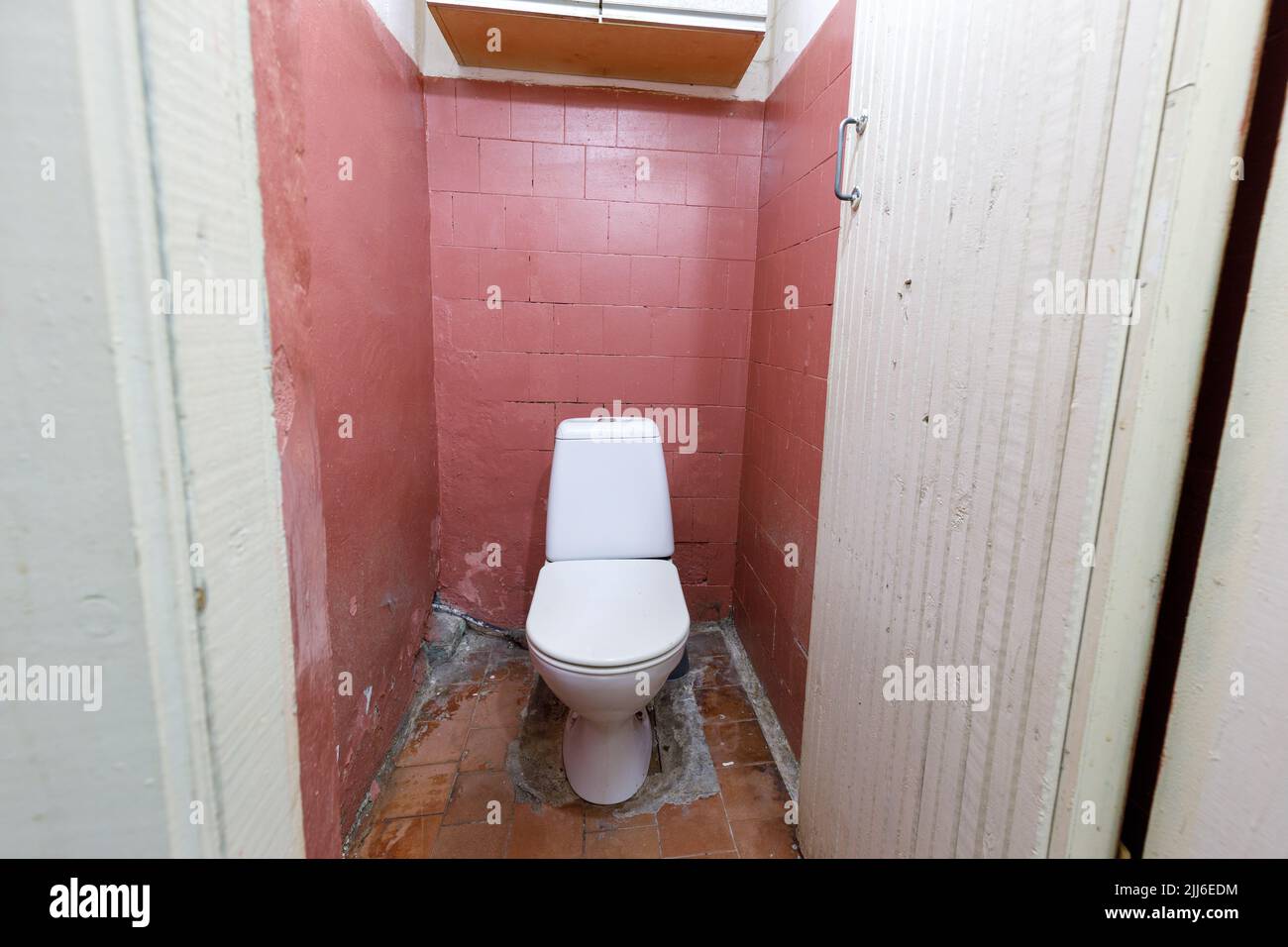 Photo of a toilet in an old apartment Stock Photo