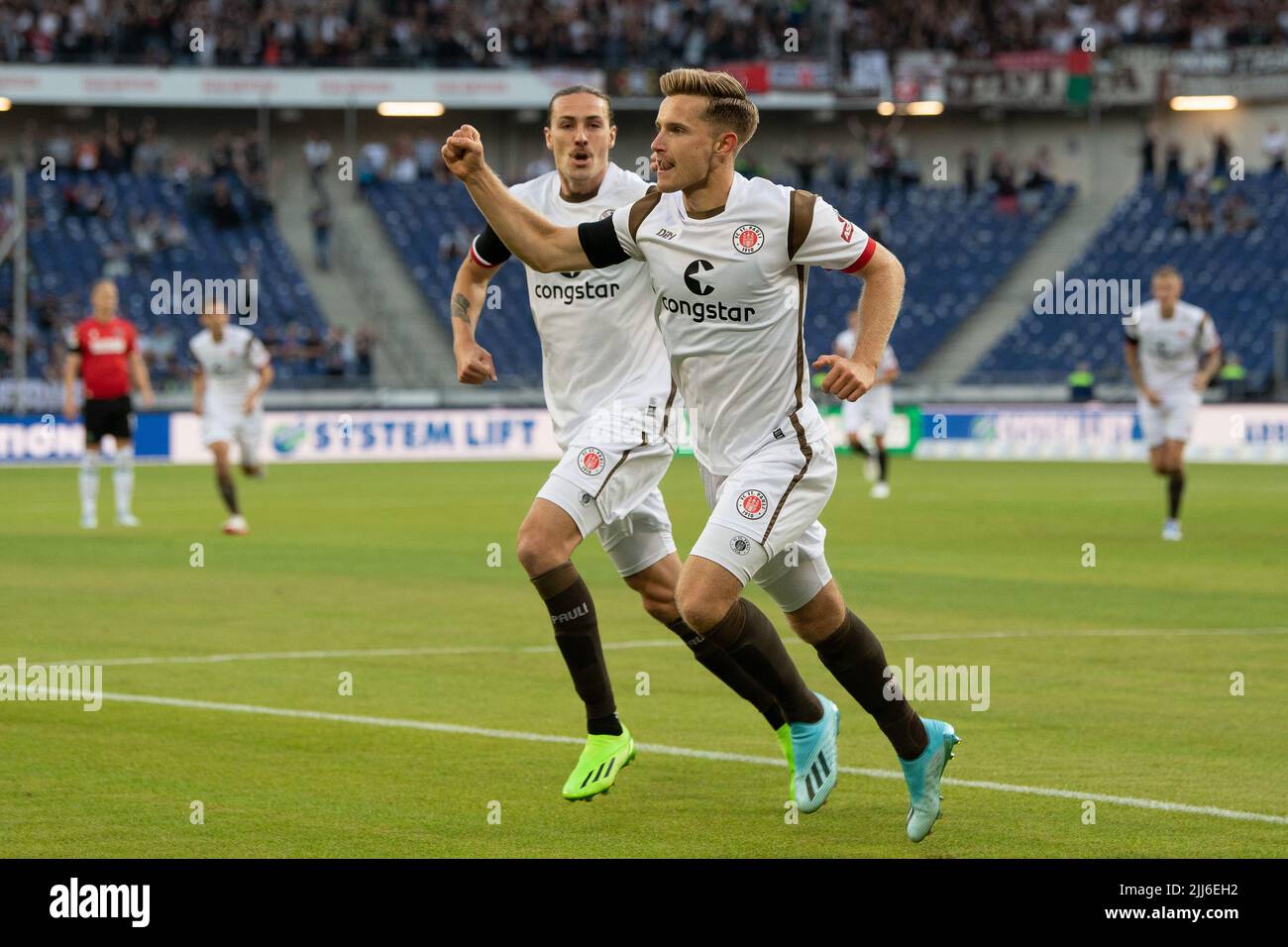Hanover, Germany. 23rd July, 2022. Soccer: 2nd Bundesliga, Hannover 96 - FC St. Pauli, Matchday 2, Heinz von Heiden Arena. St. Pauli's Johannes Eggestein celebrates after his goal to make it 0:1. Credit: Swen Pförtner/dpa - IMPORTANT NOTE: In accordance with the requirements of the DFL Deutsche Fußball Liga and the DFB Deutscher Fußball-Bund, it is prohibited to use or have used photographs taken in the stadium and/or of the match in the form of sequence pictures and/or video-like photo series./dpa/Alamy Live News Stock Photo