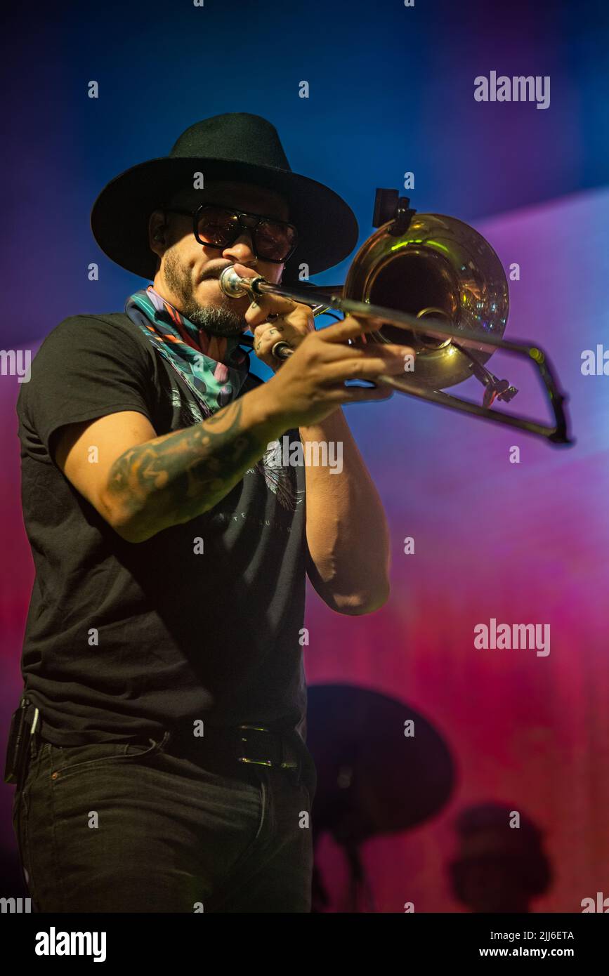 Denis Silveira plays his trombone during No te Va a Gustar rock band concert in Corrientes, Capital. Stock Photo
