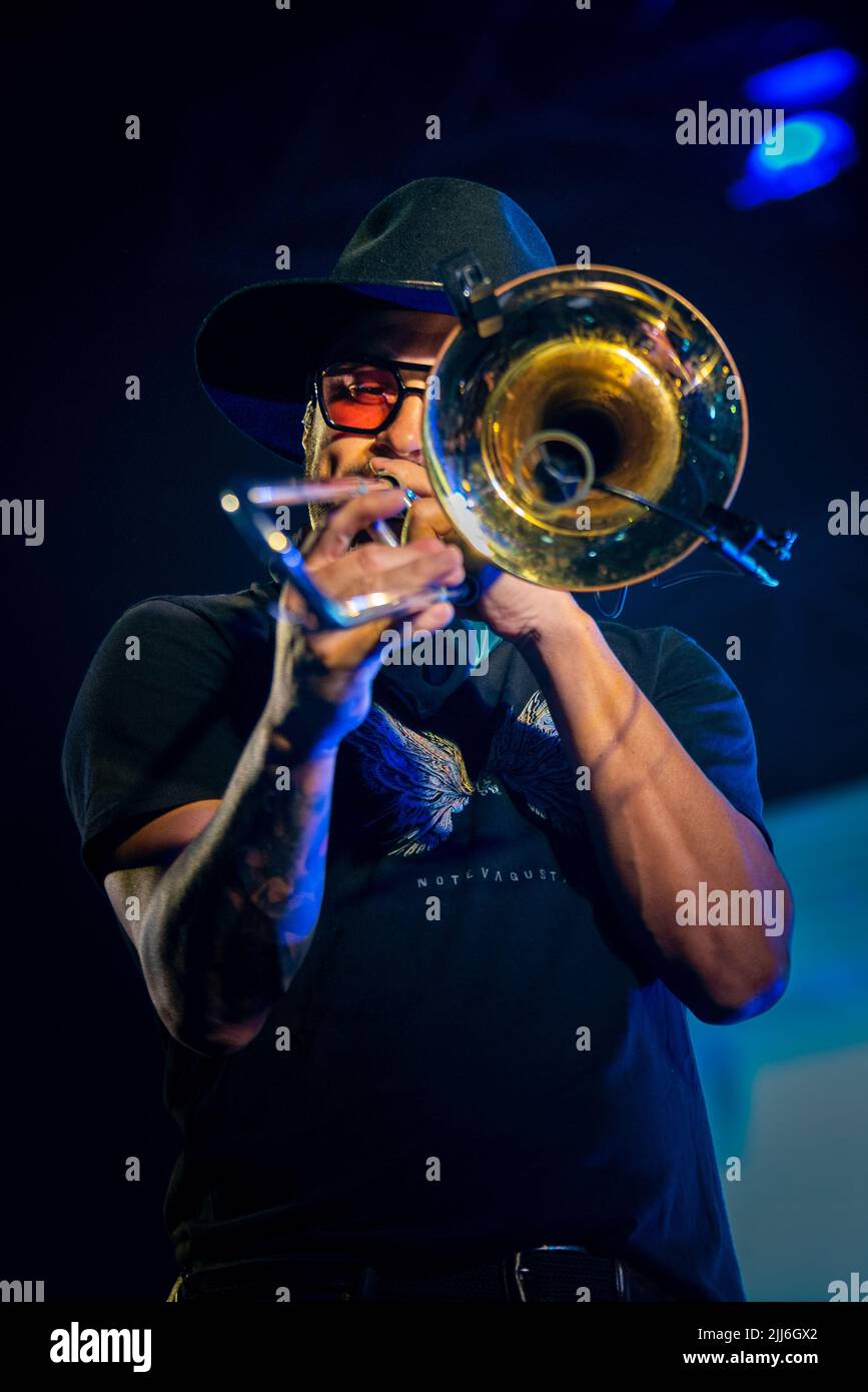 Denis Silveira plays his trombone during No te Va a Gustar rock band concert in Corrientes, Capital. Stock Photo