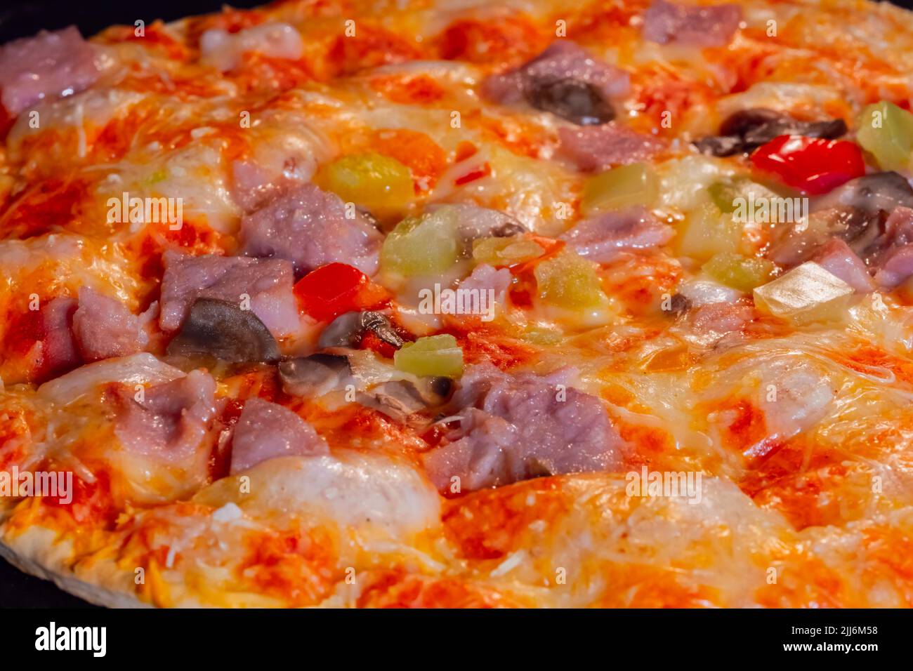 Baked homemade pizza in electric oven at home close up Stock Photo Alamy