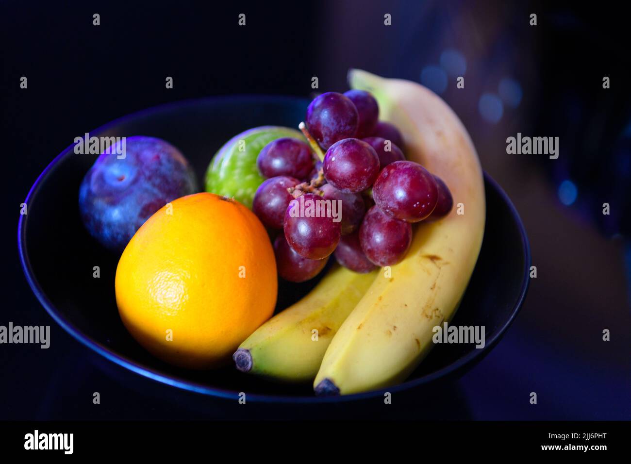 A plate with different types of fruits Stock Photo
