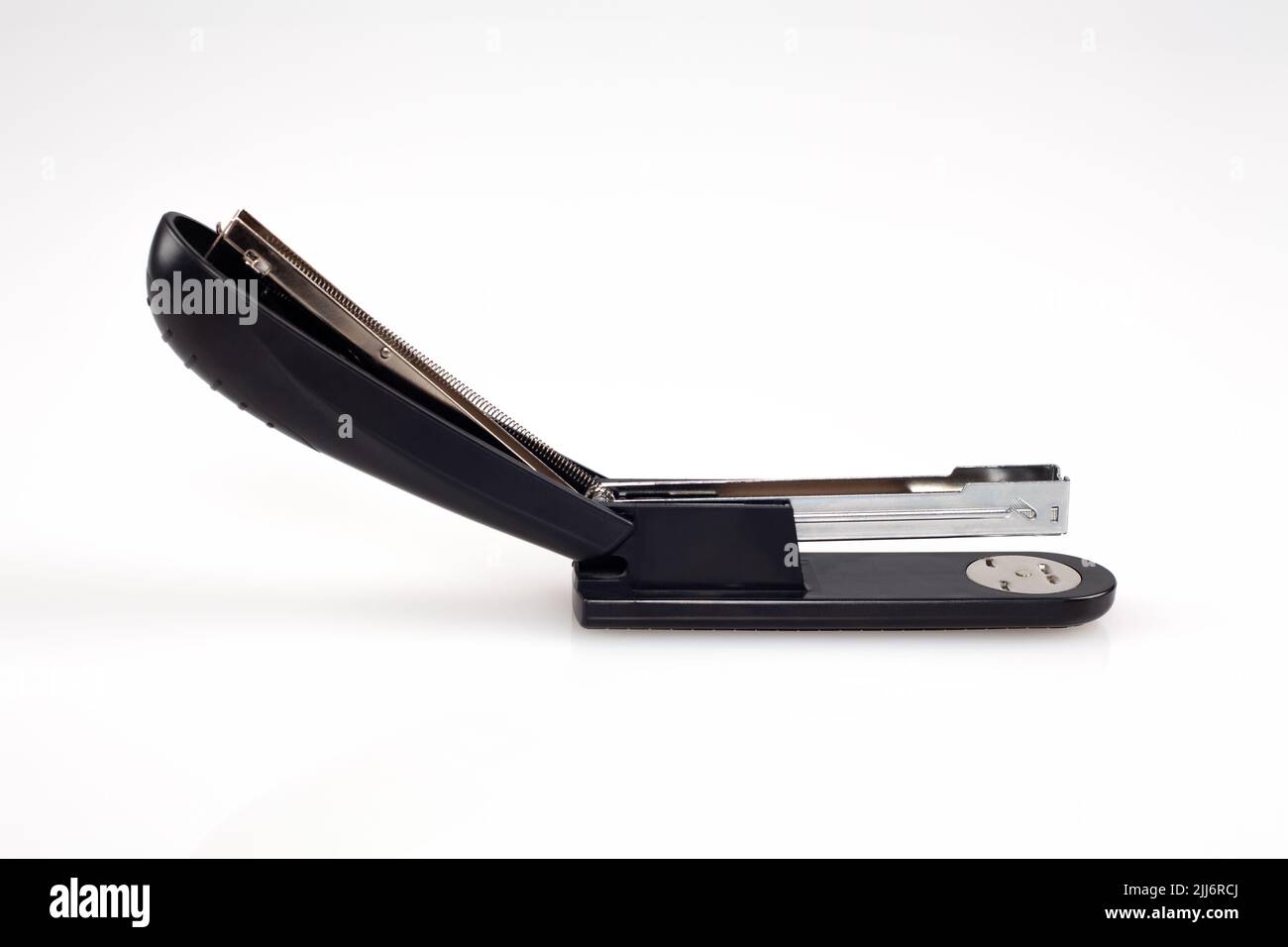 Black office stapler isolated on white background. Stock Photo