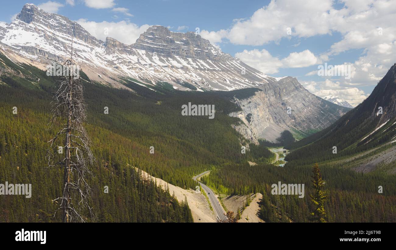 Scenic view on a Summer day from Big Hill and Big Bend viewpoint with mountain glacier landscape of Jasper National Park, along the Icefields Parkway Stock Photo