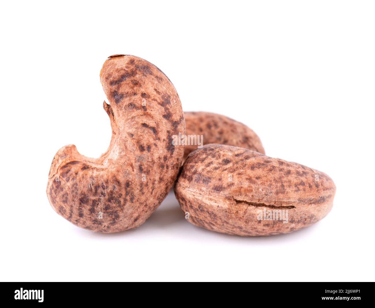 Cashew nuts in shell isolated on white background. Roasted and salted