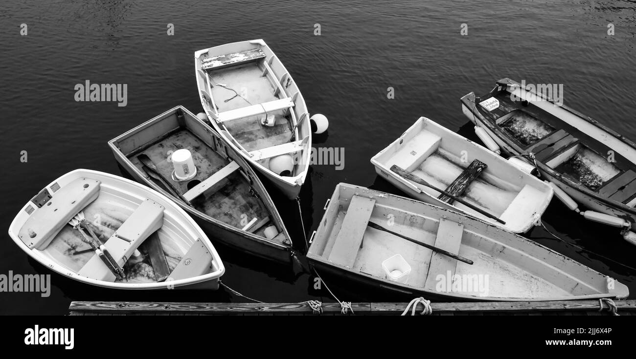 Colorful wooden fishing boats tied to the pier Stock Photo - Alamy