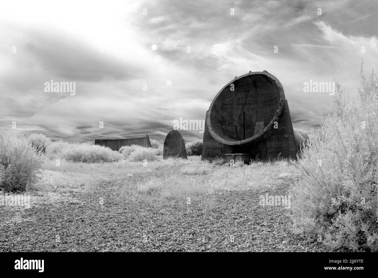 Infrared photo of Denge sound mirrors at Lade Pits, part of RSPB Dungeness Nature Reserve, Kent, England. Stock Photo
