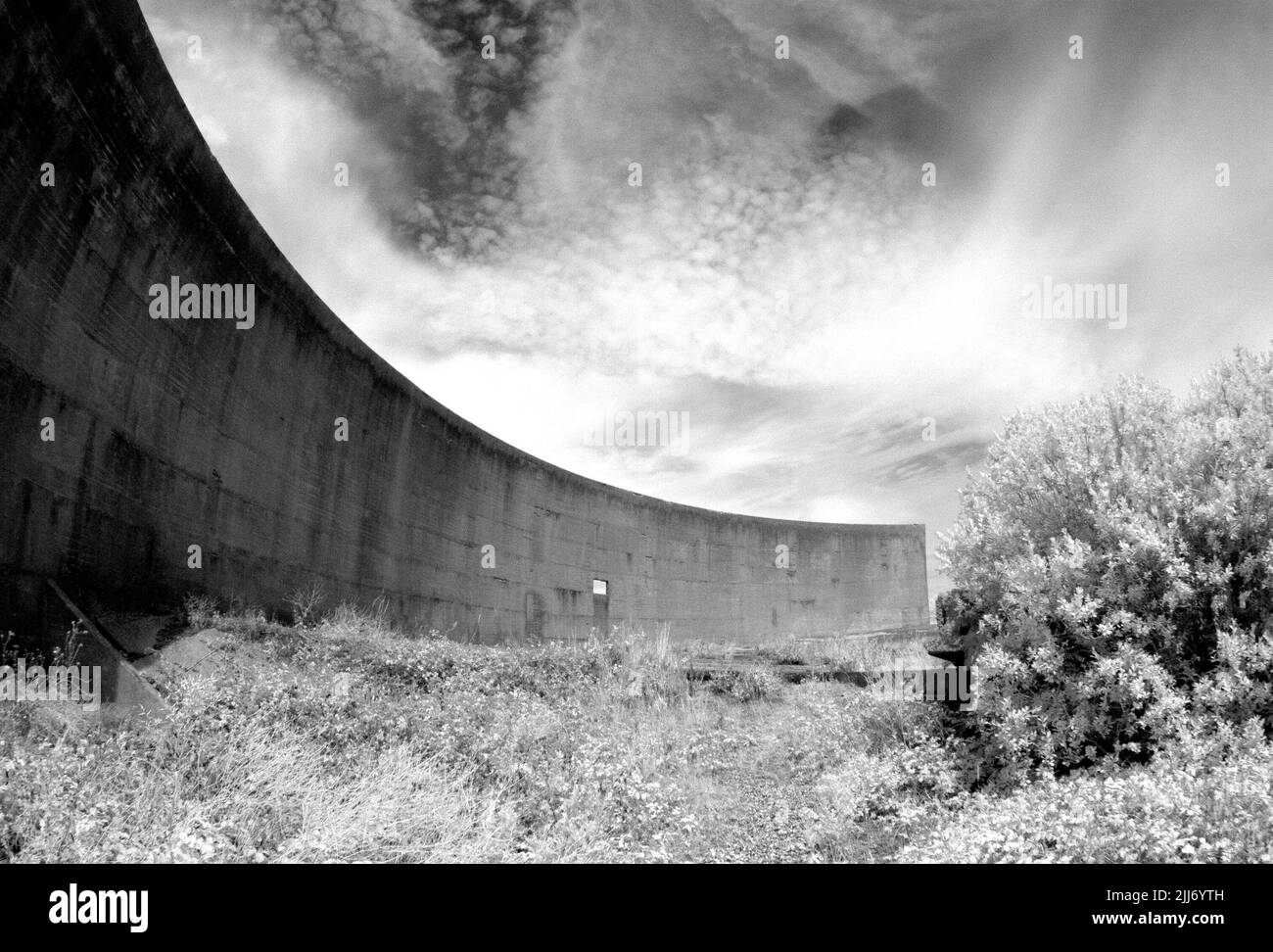 Infrared photo of the 200 foot sound mirror at Lade Pits, part of RSPB Dungeness Nature Reserve, Kent, England. Stock Photo