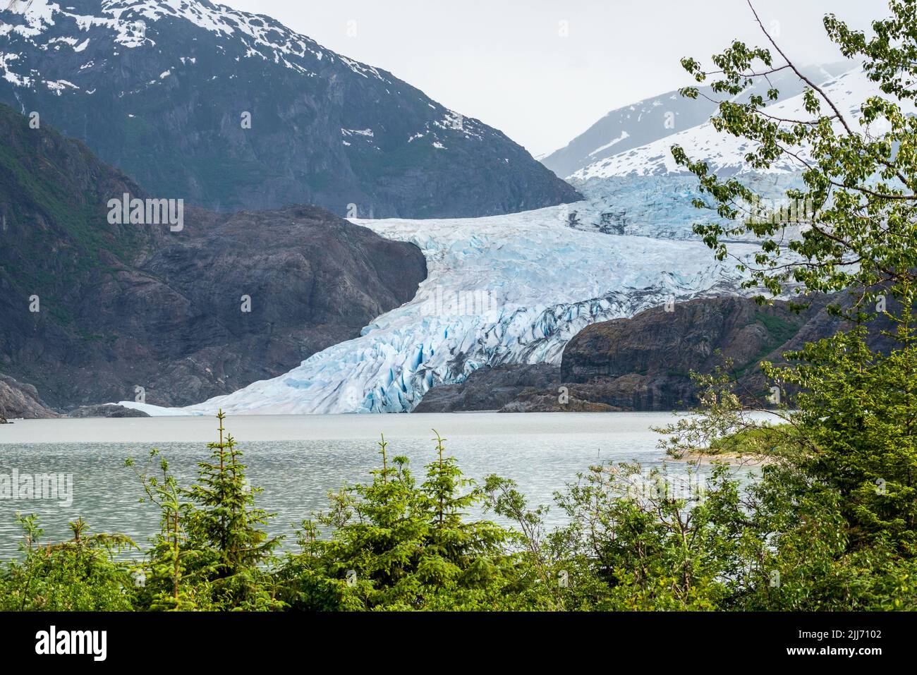 Close up of crevasses on the Mendenhall Glacier as it enters lake close to Juneau in Alaska Stock Photo
