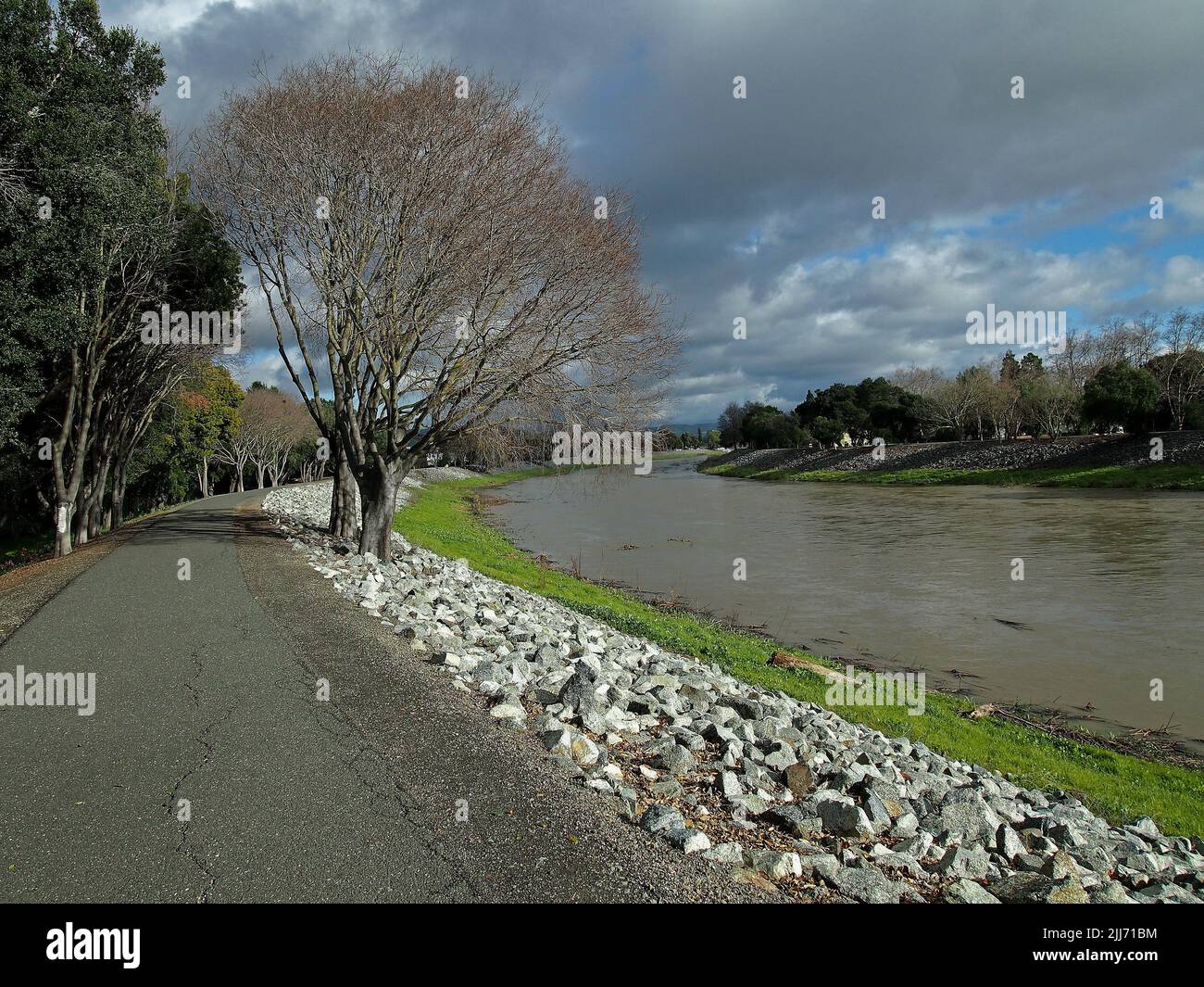 trail along the Alameda Creek after a heavy winter rain storm, Union City, California Stock Photo