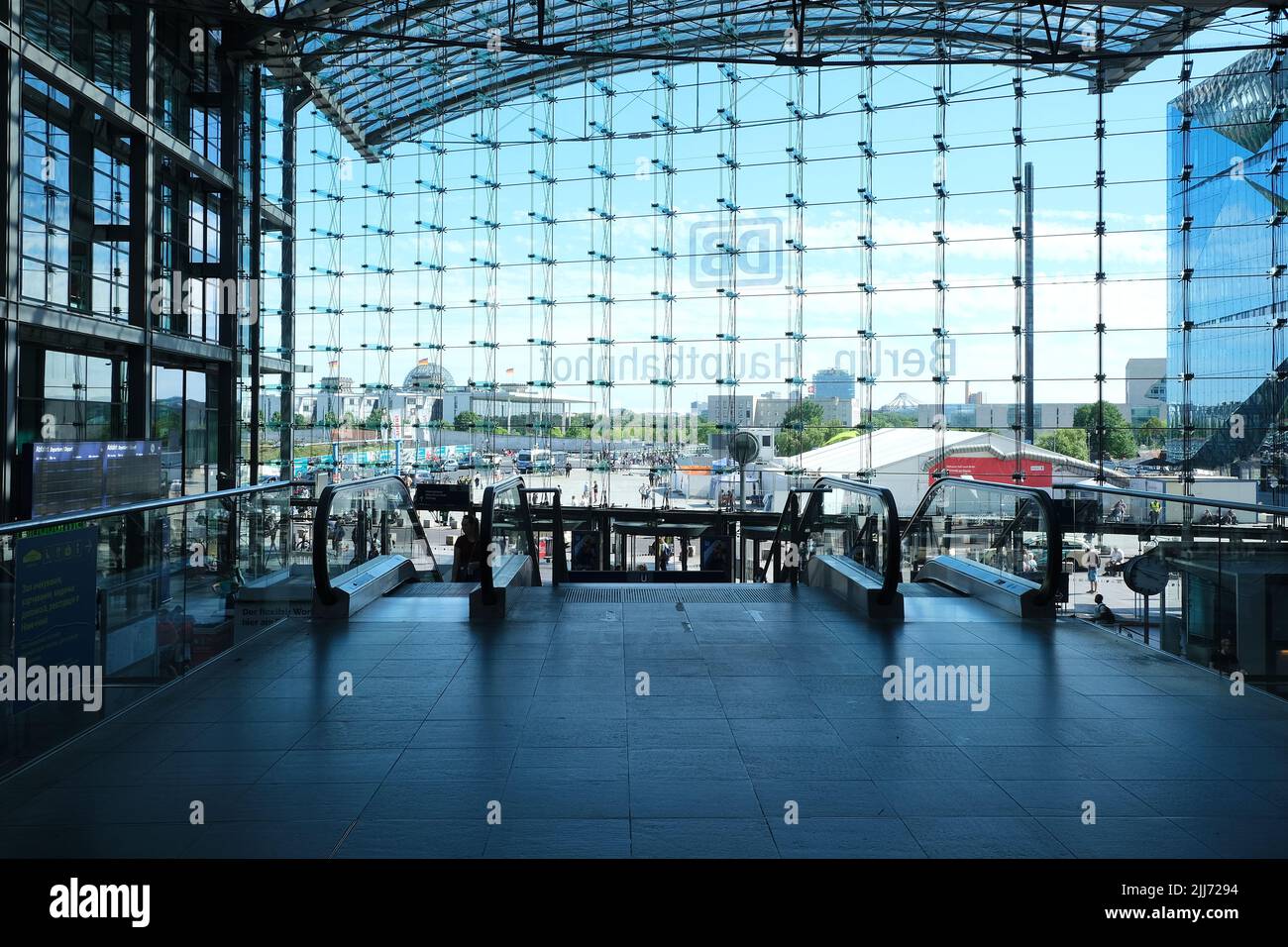 Berlin, Germany, July 14, 2022, view through the glass facade of the entrance hall in the main station towards Potsdamer Platz with the buildings of t Stock Photo