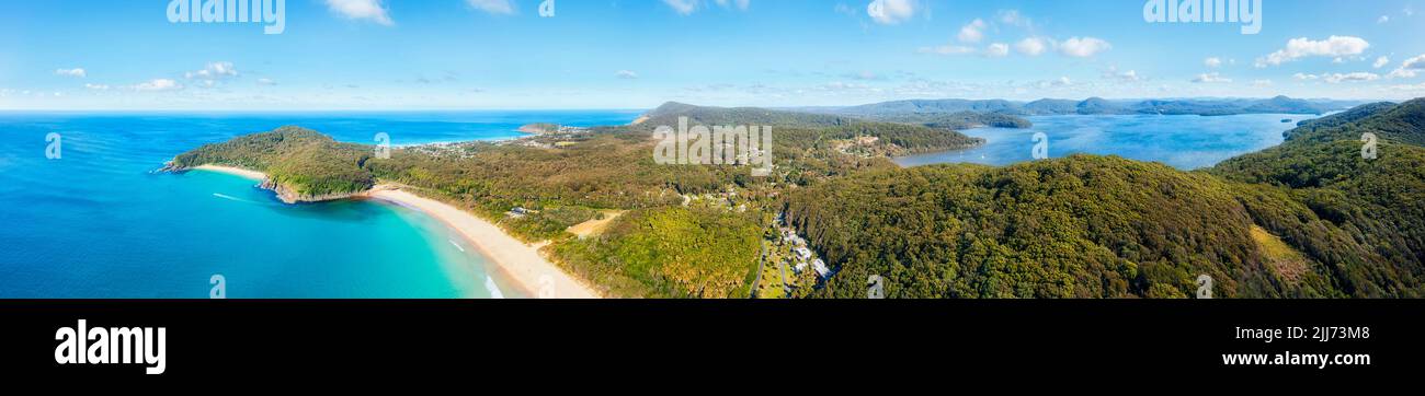 Wide aerial panorama over Booti Bootin national park near Elizabeth beach bay and shelly beach scenic coastal headlands on Australian Pacific shore. Stock Photo