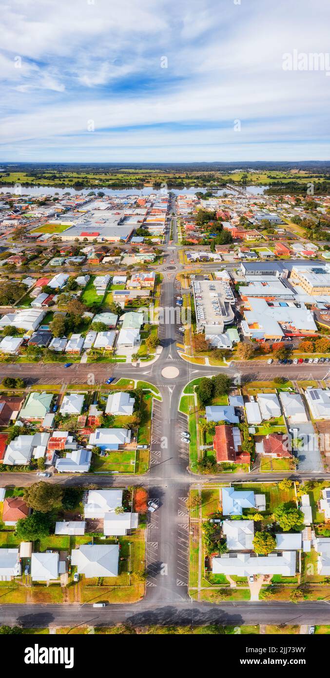 Local residential streets and houses around downtown of Taree - aerial top down to sky vertical panorama. Stock Photo