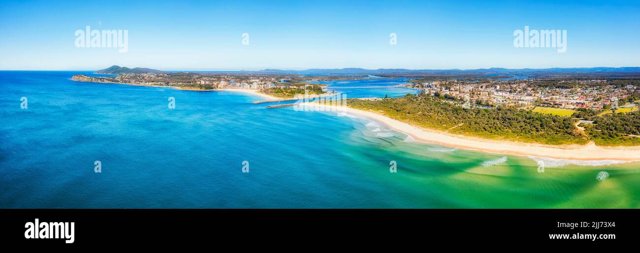 Nine mile beach in Forster Tuncurry towns on Australian Pacific coast around Wallis lake - aerial panorama from sea. Stock Photo
