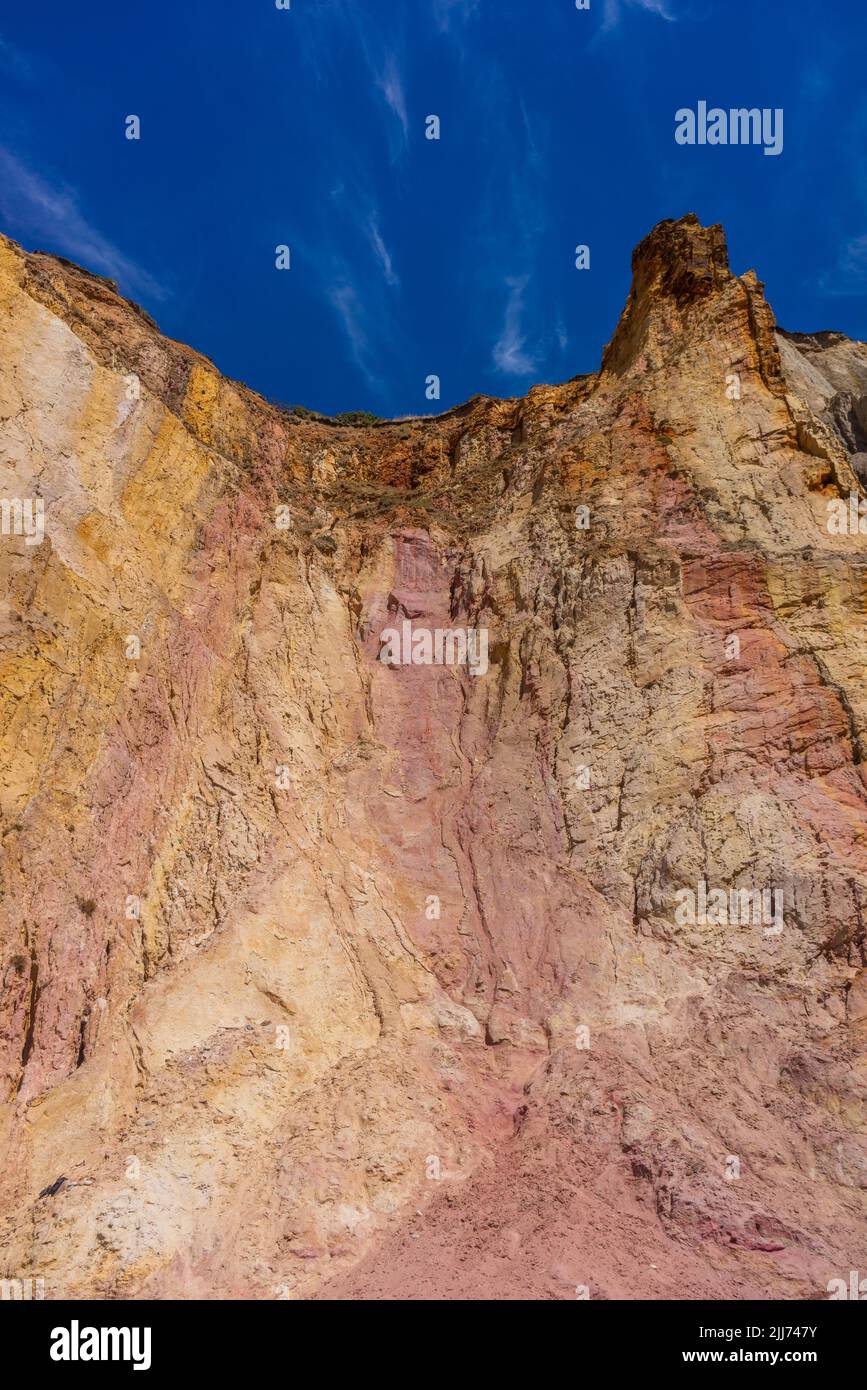 Alum Bay - place of geological interest due to its coloured sand rocks on the Isle of Wight, England, UK Stock Photo