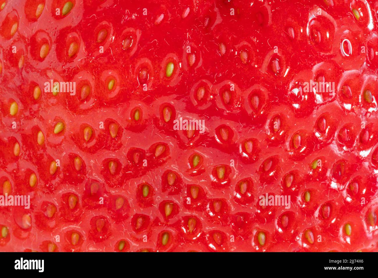 Background detail of a strawberry seen very closely Stock Photo - Alamy