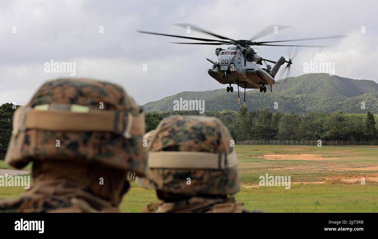 U.S. Marines with 3d Battalion, 12th Marines conduct an airlift of a Joint Light Tactical Vehicle at a helicopter external lift drill on Camp Hansen, Okinawa, Japan, July 19, 2022. 3/12 regularly conducts airlift training to improve rapid insertion and extraction of equipment, producing lethal, ready, and adaptable forces capable of operations across a wide range of missions. (U.S. Marine Corps photo by Cpl. Alyssa Chuluda) Stock Photo