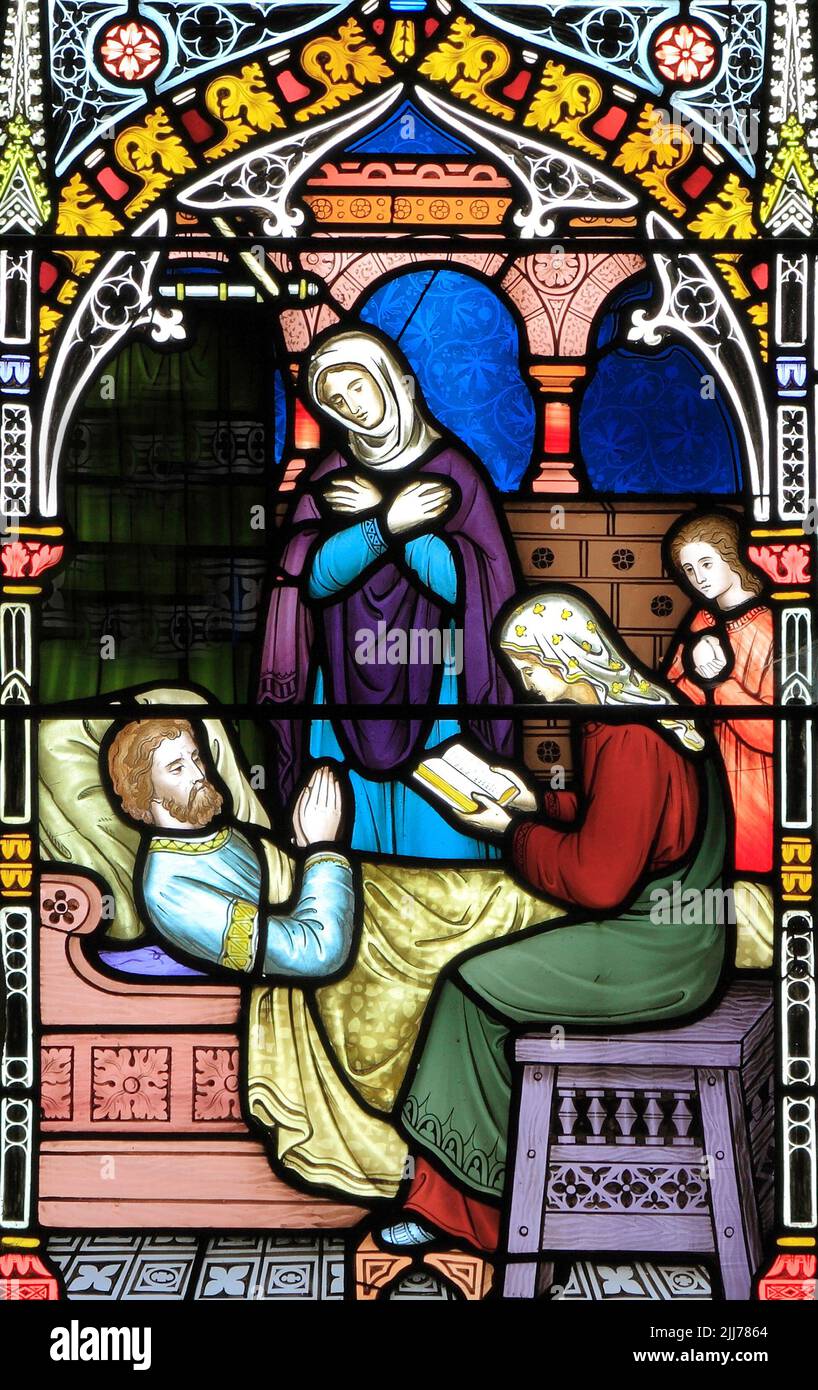Corporal Acts of Mercy window, stained glass window, by Frederick Preedy, 1868, visiting the sick, Gunthorpe, Norfolk, England, UK Stock Photo