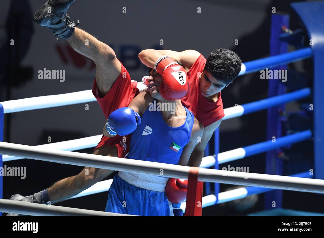Mubarak Al Kabeer Governorate. 24th July, 2022. Abbas Sayed Fadhel (above) of Bahrain fights against Mbarek Mansour of Kuwait in the men's 51kg match at the first Kuwait International Boxing Championship in Mubarak Al-Kabeer Governorate, Kuwait, July 23, 2022. Credit: Ghazy Qaffaf/Xinhua/Alamy Live News Stock Photo