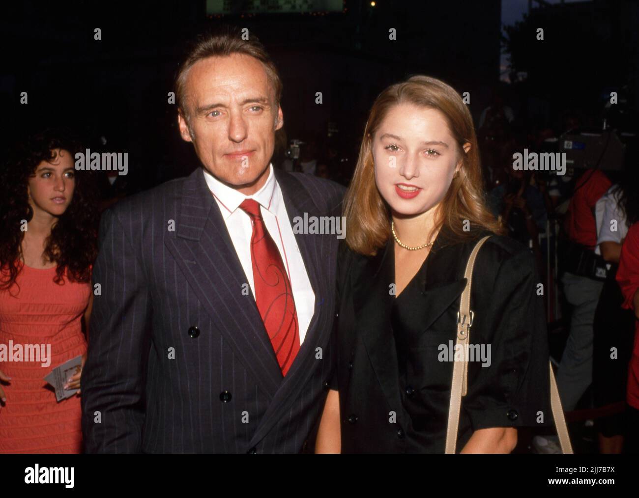 Dennis Hopper and Katherine LaNasa Circa 1990's Credit: Ralph Dominguez/MediaPunch Stock Photo