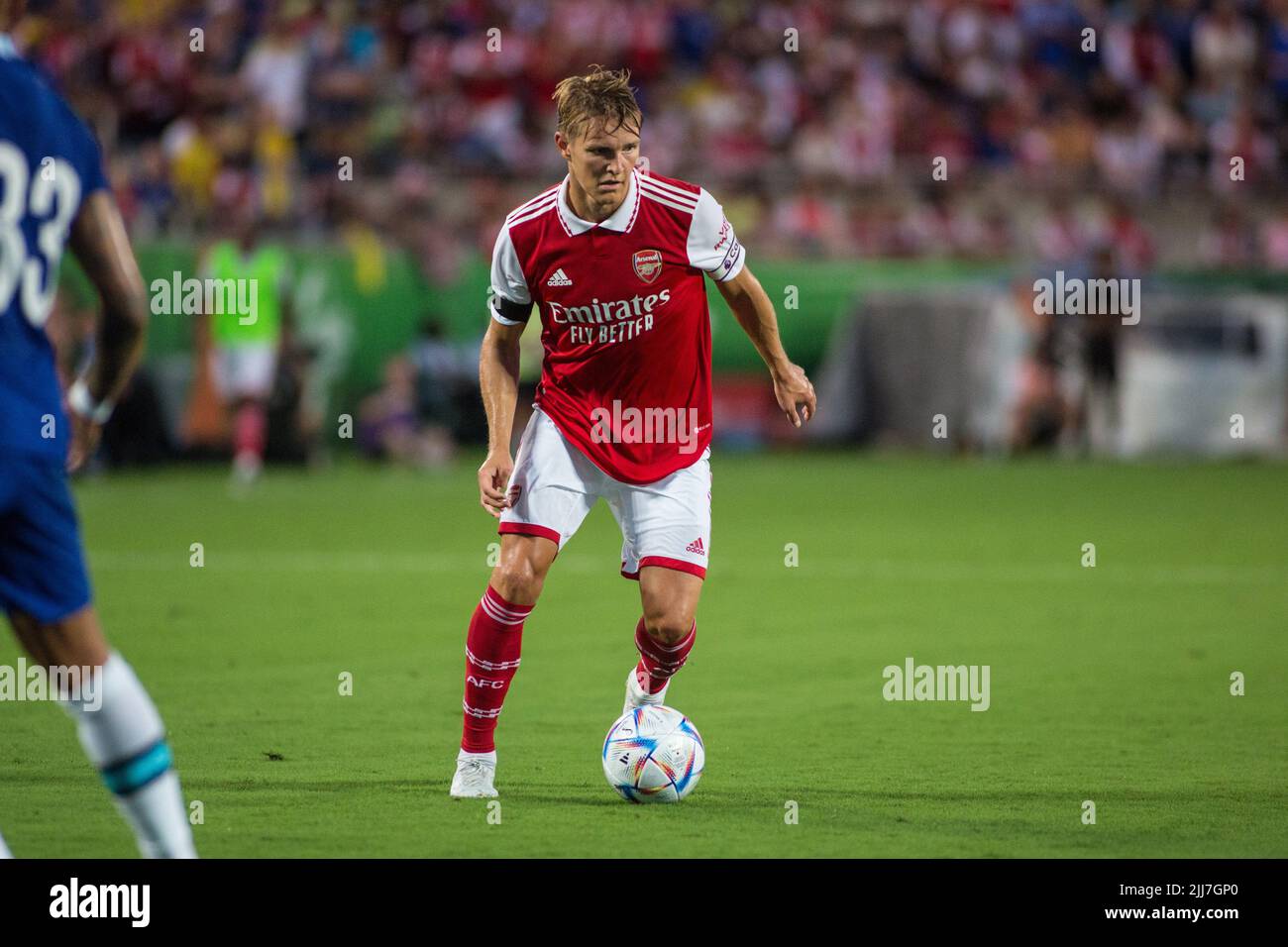 July 23, 2022: Arsenal FC midfielder Martin Odegaard (8) looks for an opening during the Florida Cup match between Arsenal FC and Chelsea FC Orlando, FL. Jonathan Huff/CSM. Stock Photo