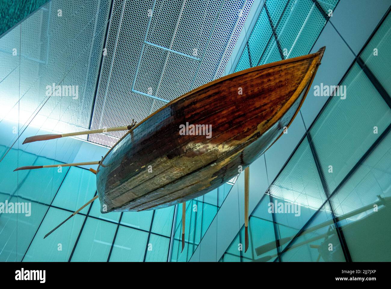 Suspended rowing boat on display at Boola Bardip WA Museum Stock Photo