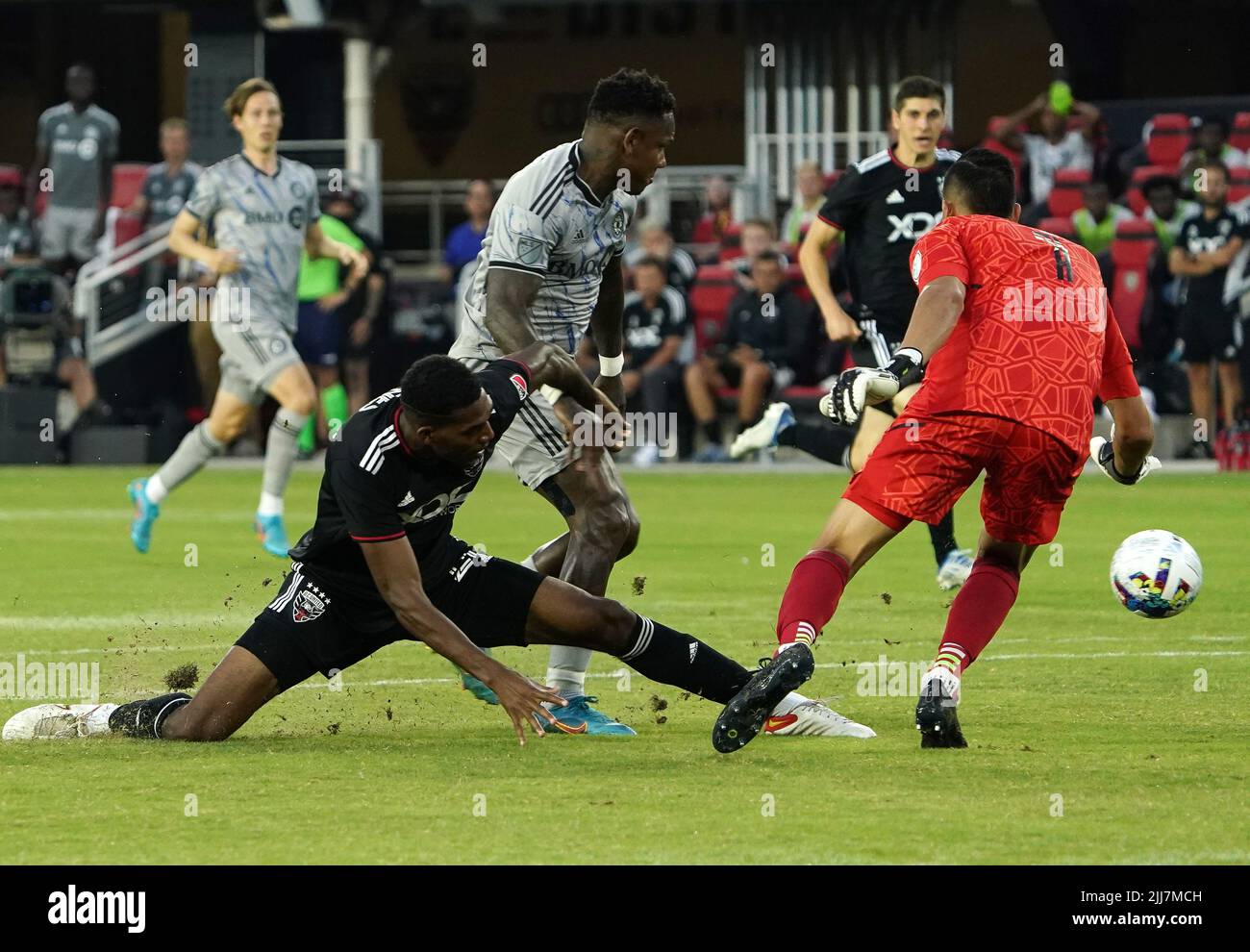 WASHINGTON, DC, USA - 23 JULY 2022: CF Montréal forward Romell Quioto (30) puts the ball past D.C. United goalkeeper Rafael Romo (1) for a first minute goal during a MLS match between D.C United and C.F. Montreal, on July 23, 2022, at Audi Field, in Washington, DC. (Photo by Tony Quinn-Alamy Live News) Stock Photo