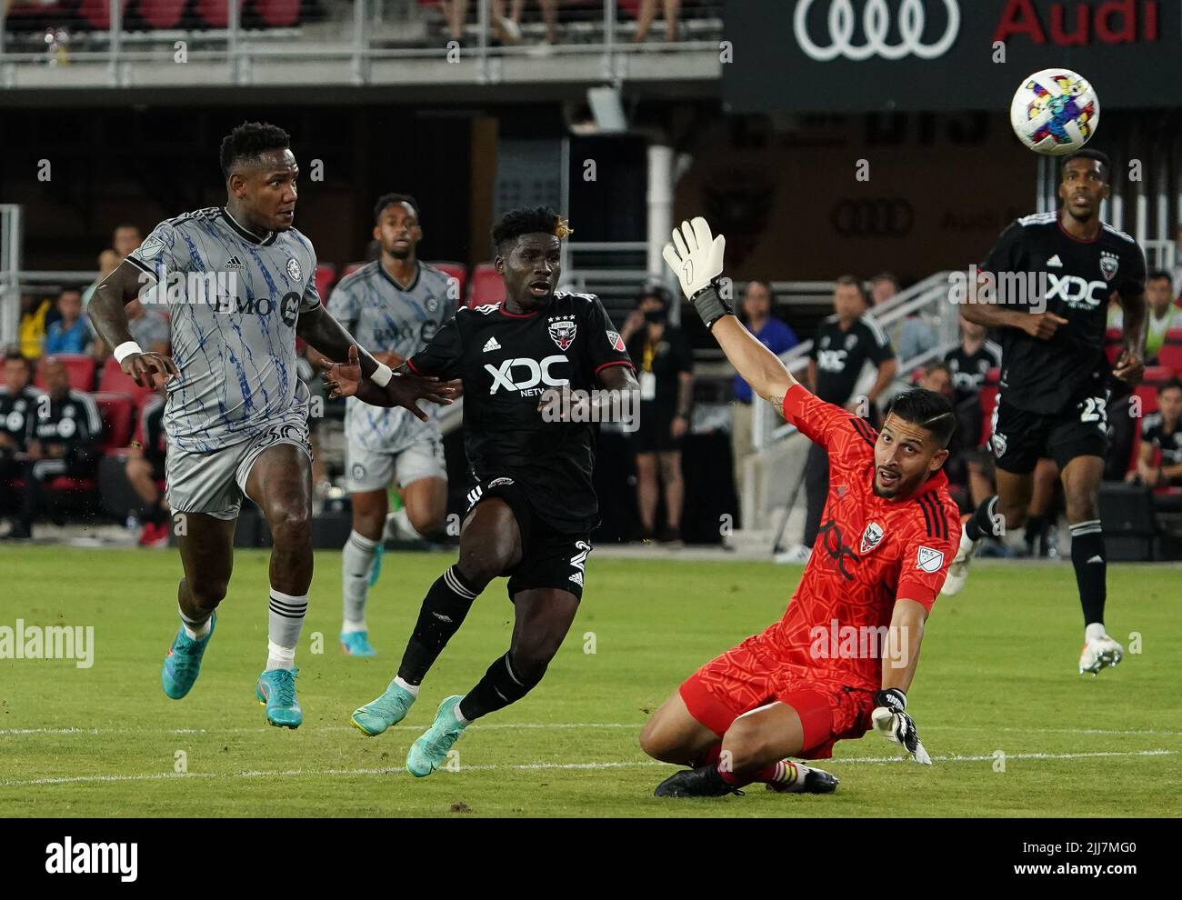 WASHINGTON, DC, USA - 23 JULY 2022: CF Montréal forward Romell Quioto (30) shoots past D.C. United goalkeeper Rafael Romo (1) for his second goal during a MLS match between D.C United and C.F. Montreal, on July 23, 2022, at Audi Field, in Washington, DC. (Photo by Tony Quinn-Alamy Live News) Stock Photo