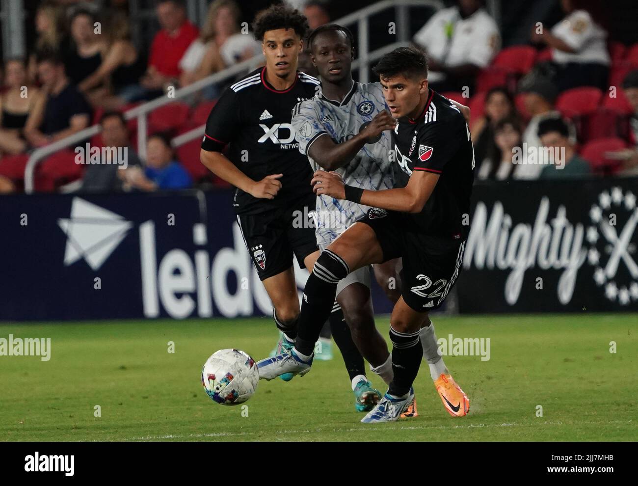 WASHINGTON, DC, USA - 23 JULY 2022: D.C. United forward Miguel Berry (22) moves away from CF Montréal midfielder Ismaël Koné (28) during a MLS match between D.C United and C.F. Montreal, on July 23, 2022, at Audi Field, in Washington, DC. (Photo by Tony Quinn-Alamy Live News) Stock Photo
