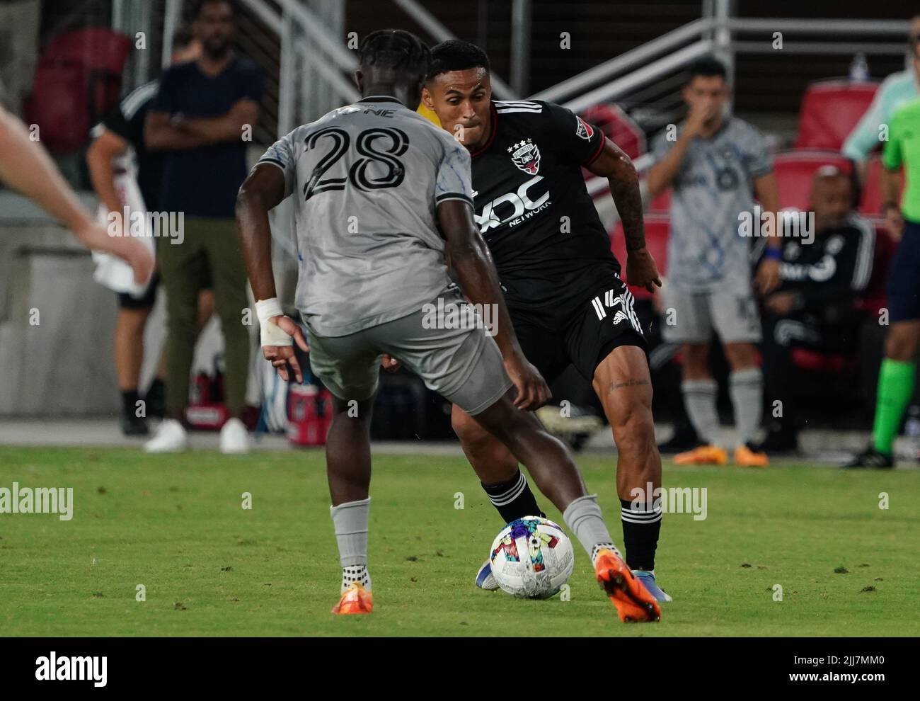 WASHINGTON, DC, USA - 23 JULY 2022: CF Montréal midfielder Ismaël Koné (28) defends against D.C. United midfielder Andy Najar (14) during a MLS match between D.C United and C.F. Montreal, on July 23, 2022, at Audi Field, in Washington, DC. (Photo by Tony Quinn-Alamy Live News) Stock Photo