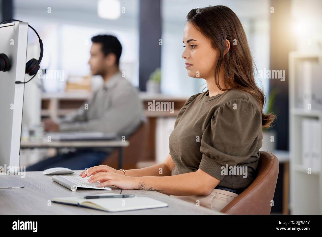 Woman pushing computer through hi-res stock photography and images - Alamy