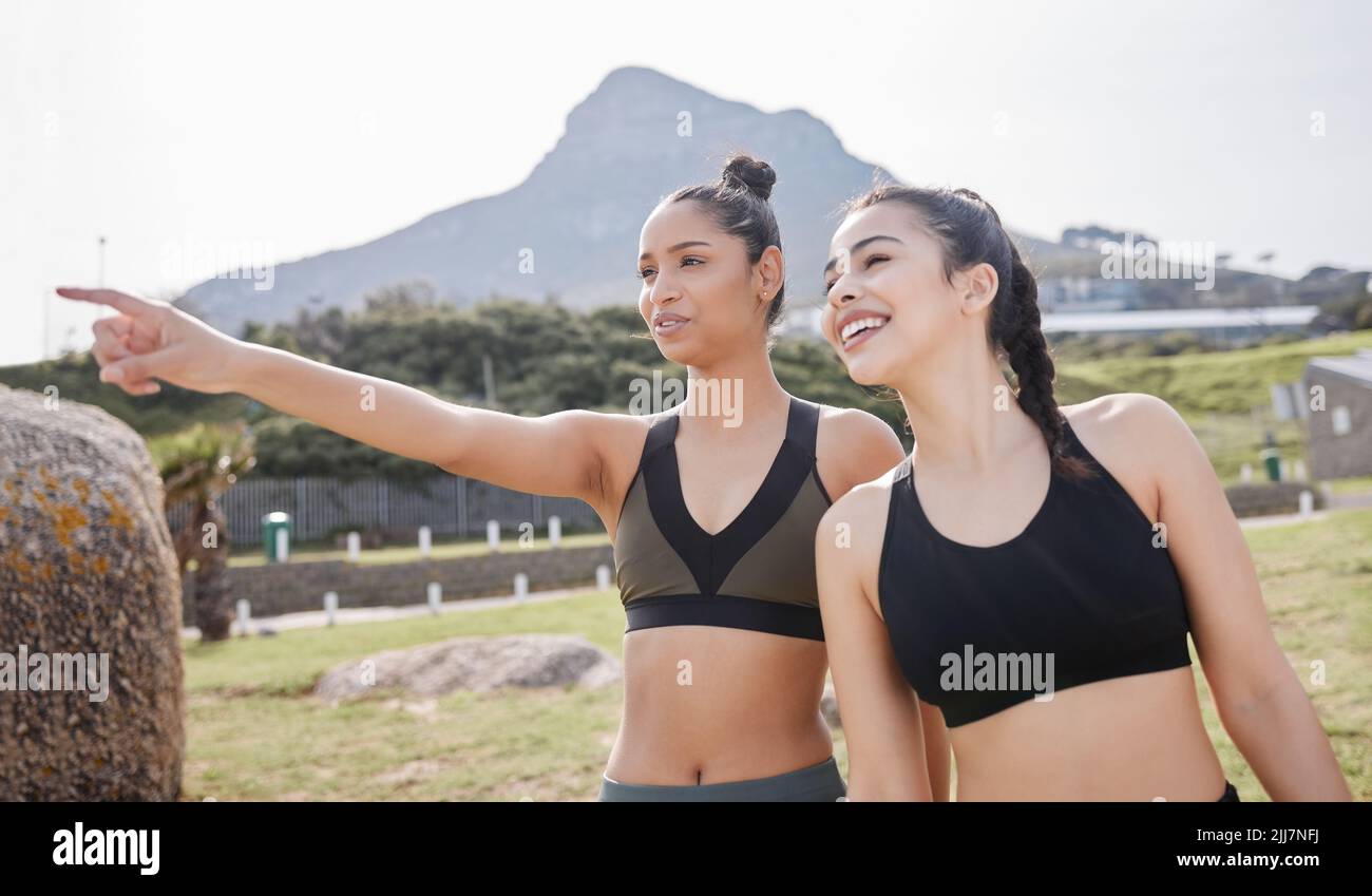 The best competition is healthy competition. a young women pointing ...