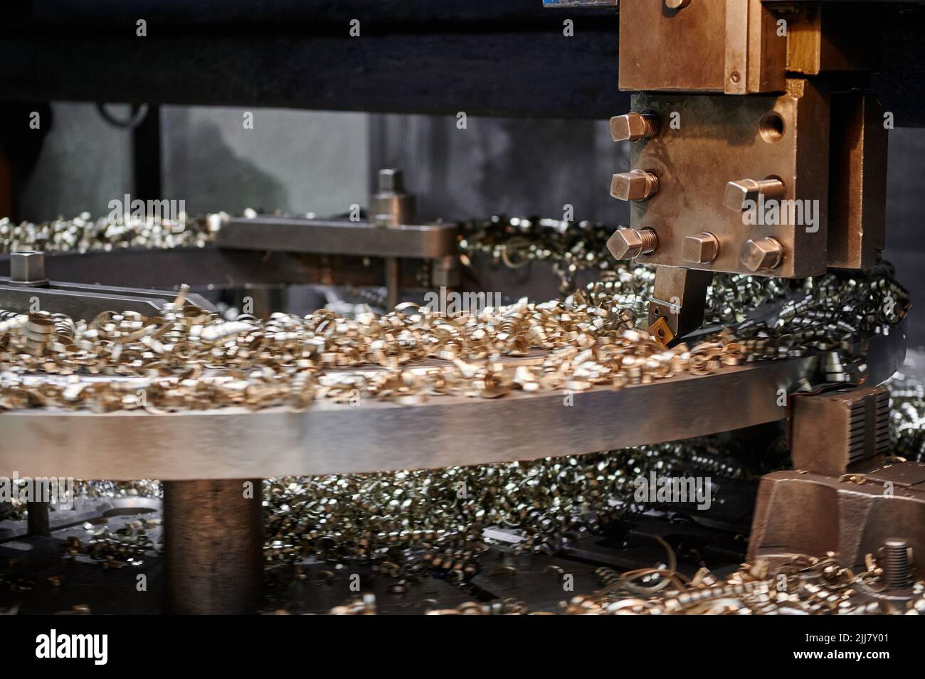 Processing metal part with boring and turning lathe machine Stock Photo