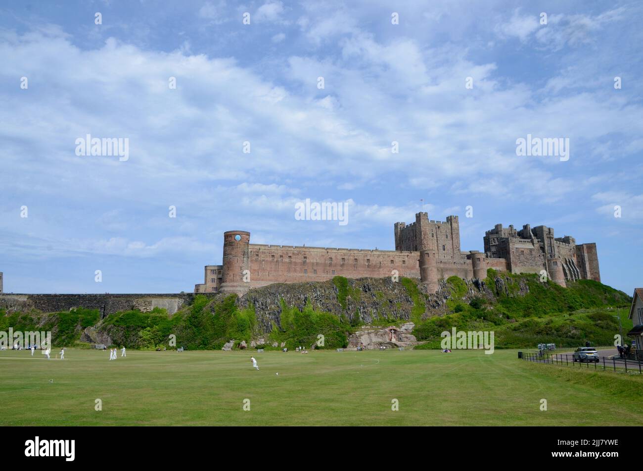 cricket match in front of bamburgh castle northumberland england great britain 2022 Stock Photo