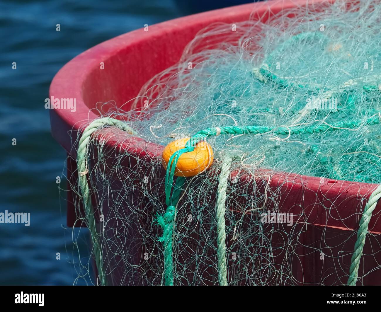 Blue fisher net to catch fish Stock Photo Alamy