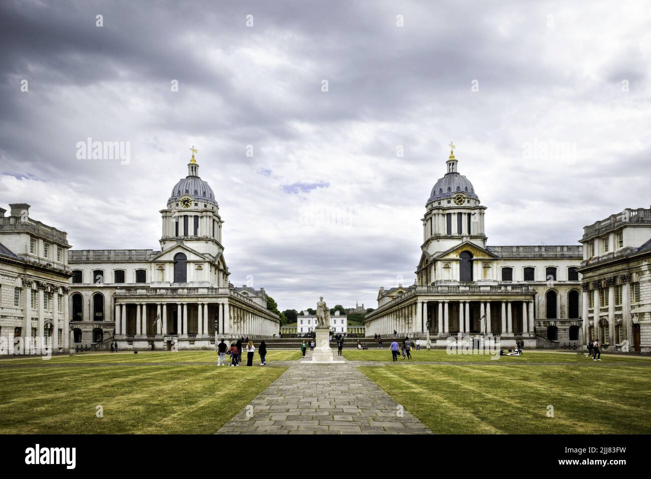 June 19 2022 - Greenwich, London, UK - People visit the tourist site of the Old Royal Naval College in Greenwich London Stock Photo