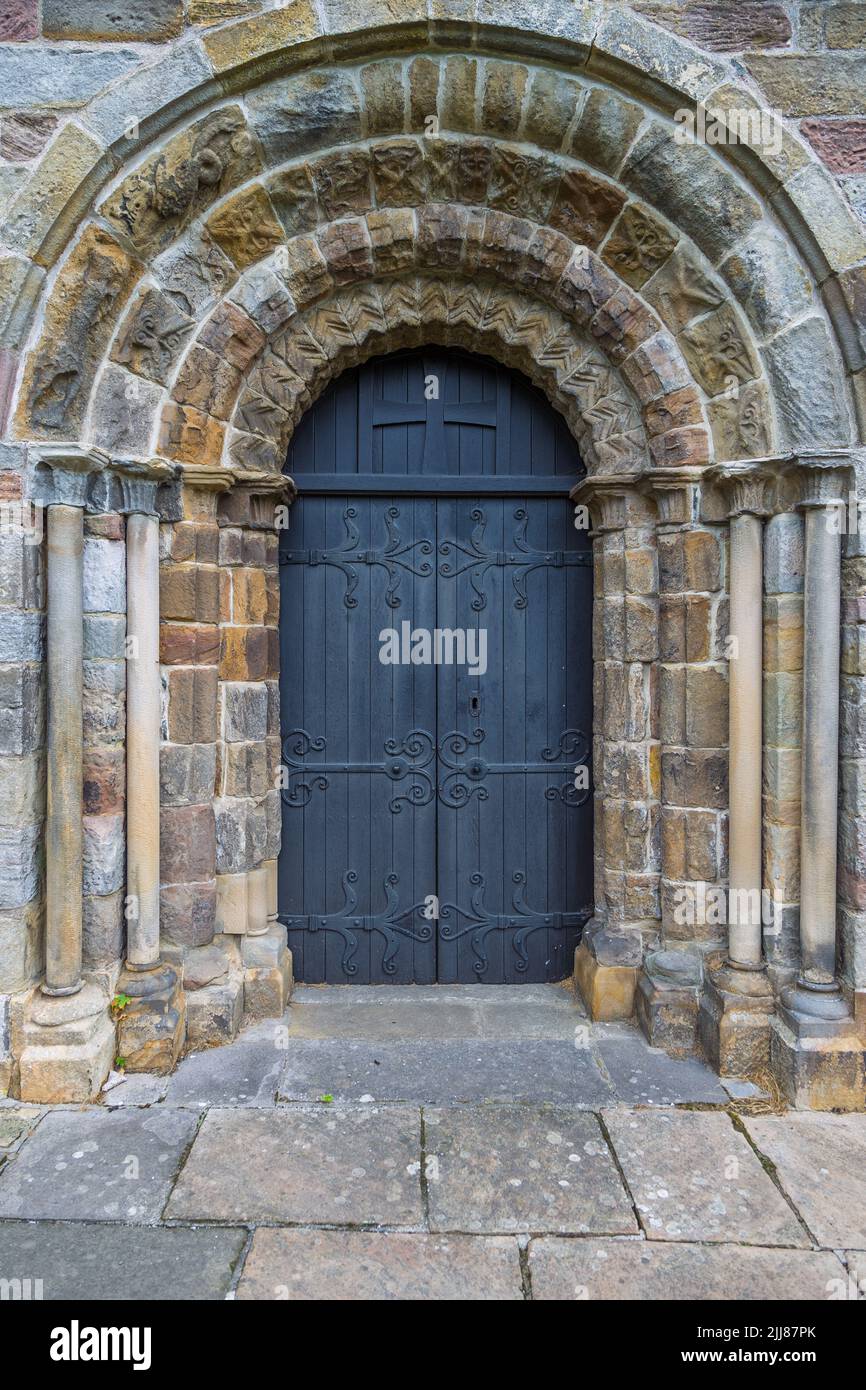 Black classic door to the Kirkby Lonsdale Saint Marys Church, Stone