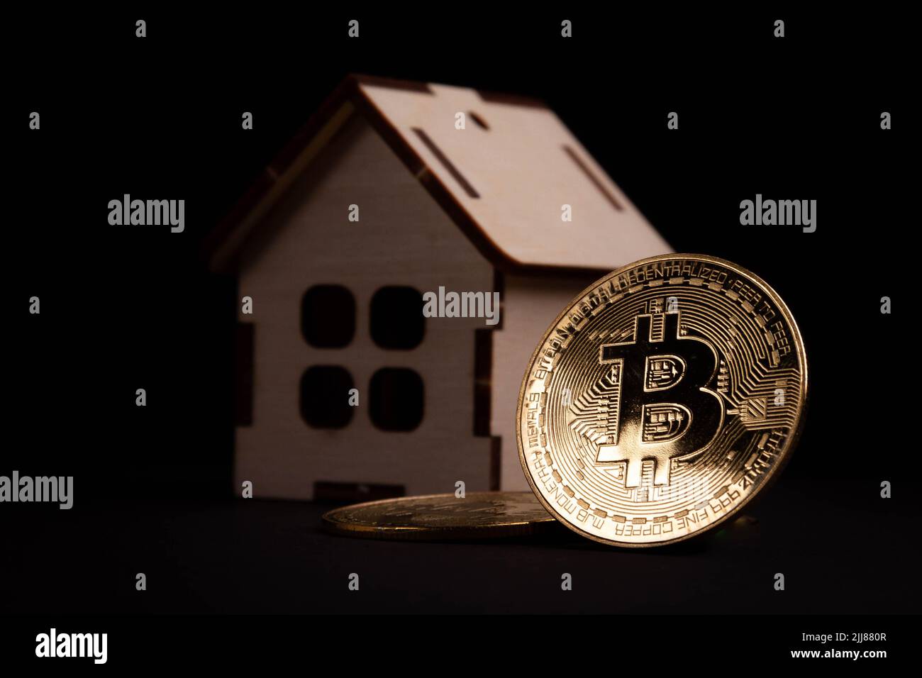 Buying real estate for cryptocurrency. Housing and bitcoins. Coins and house  keys. Small wooden house and bitcoin coin Stock Photo - Alamy
