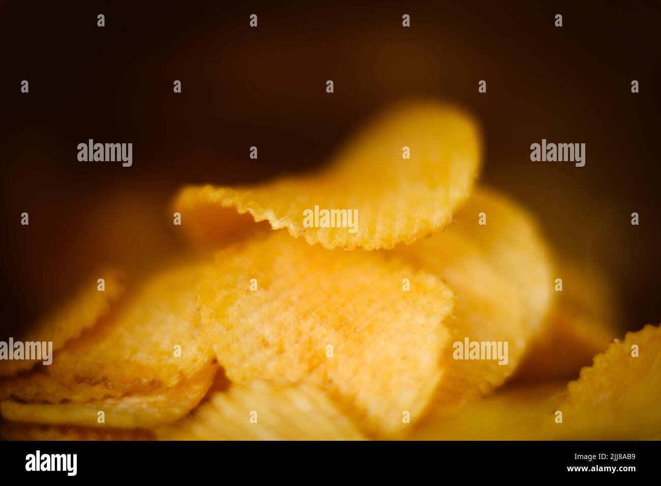 junk fast food eating crispy chips crunchy potato Stock Photo Alamy