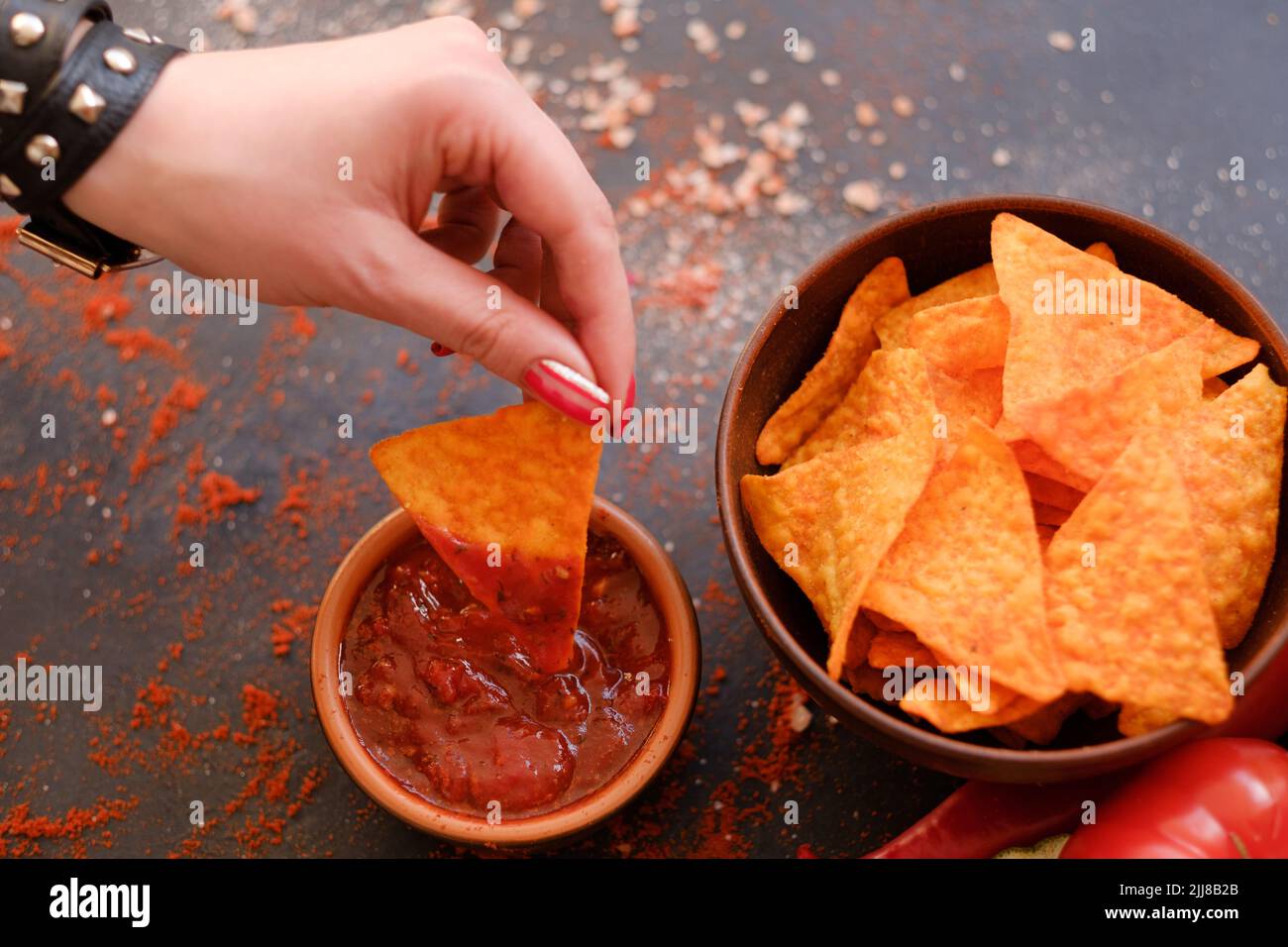 nacho chips party munchies food snack sauce dip Stock Photo