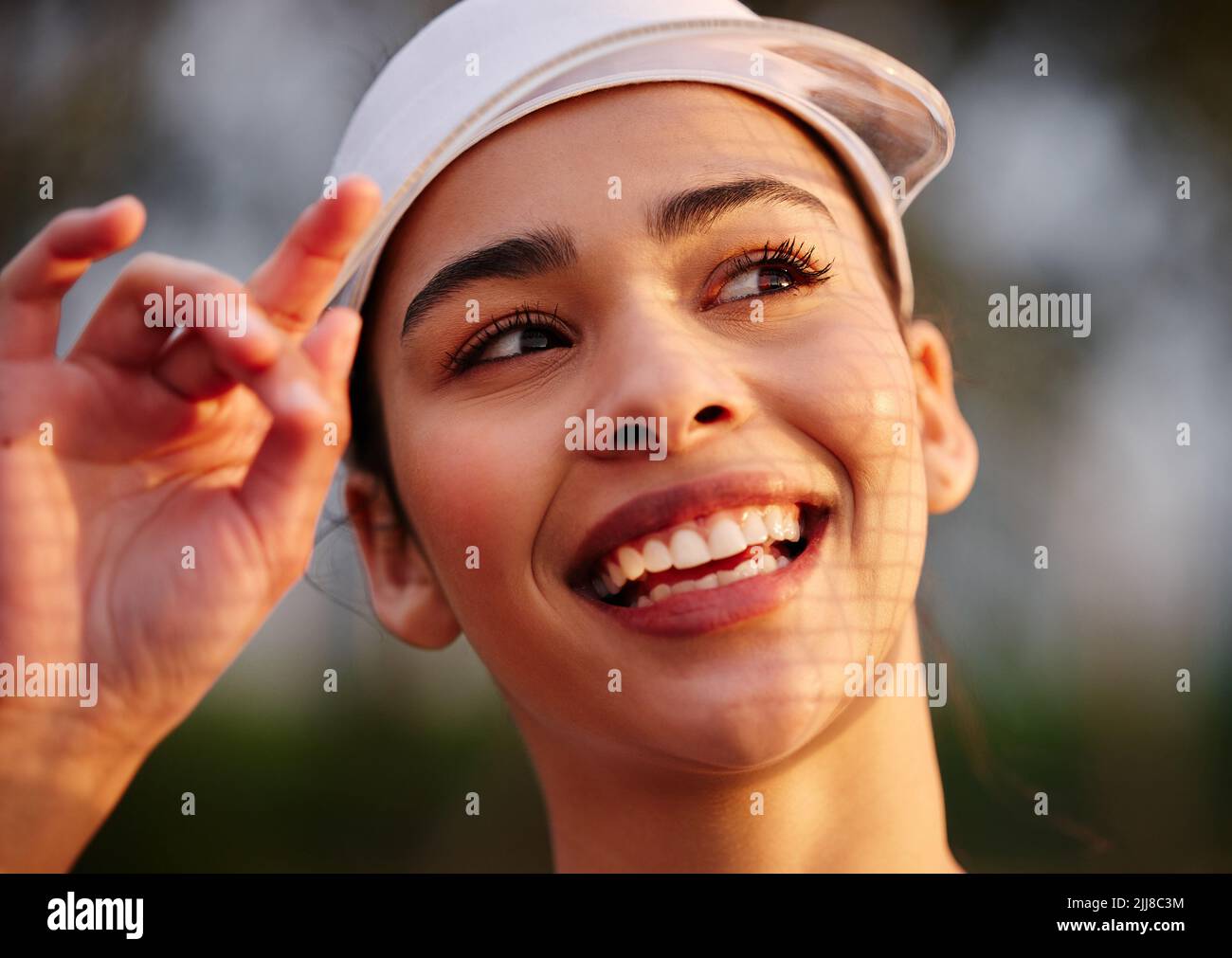 Woman wearing visor hi-res stock photography and images - Page 2 - Alamy