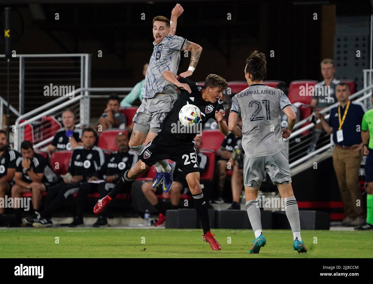 WASHINGTON, DC, USA - 23 JULY 2022: CF Montréal defender Joel Waterman (16) heads down over D.C. United midfielder Jackson Hopkins (25) during a MLS match between D.C United and C.F. Montreal, on July 23, 2022, at Audi Field, in Washington, DC. (Photo by Tony Quinn-Alamy Live News) Stock Photo