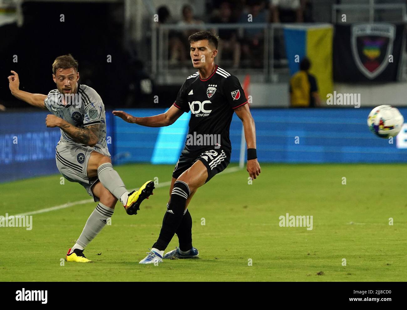 WASHINGTON, DC, USA - 23 JULY 2022: CF Montréal defender Gabriele Corbo (5) shoots past D.C. United forward Miguel Berry (22) during a MLS match between D.C United and C.F. Montreal, on July 23, 2022, at Audi Field, in Washington, DC. (Photo by Tony Quinn-Alamy Live News) Stock Photo