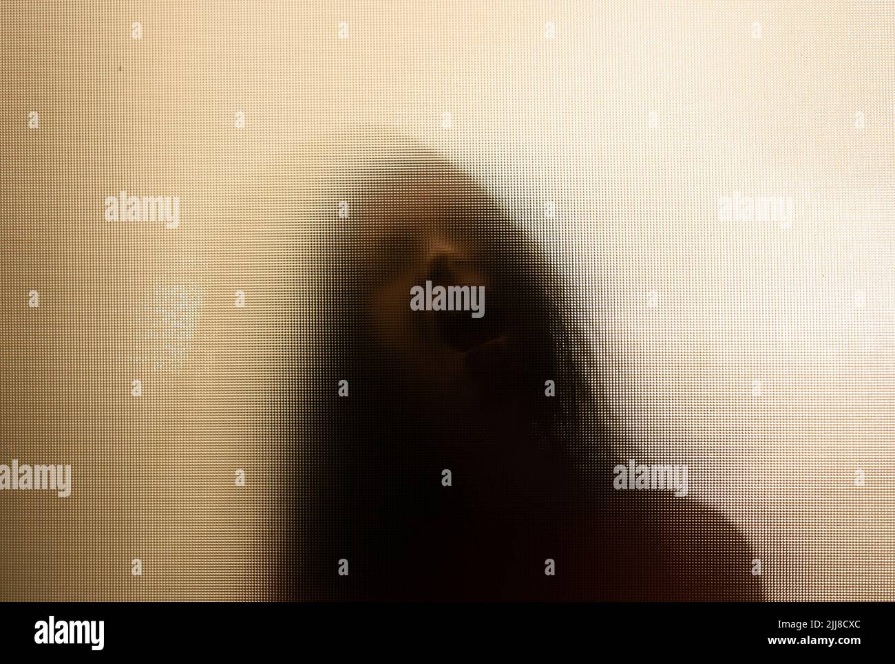 Silhouette behind matte glass hi-res stock photography and images - Alamy