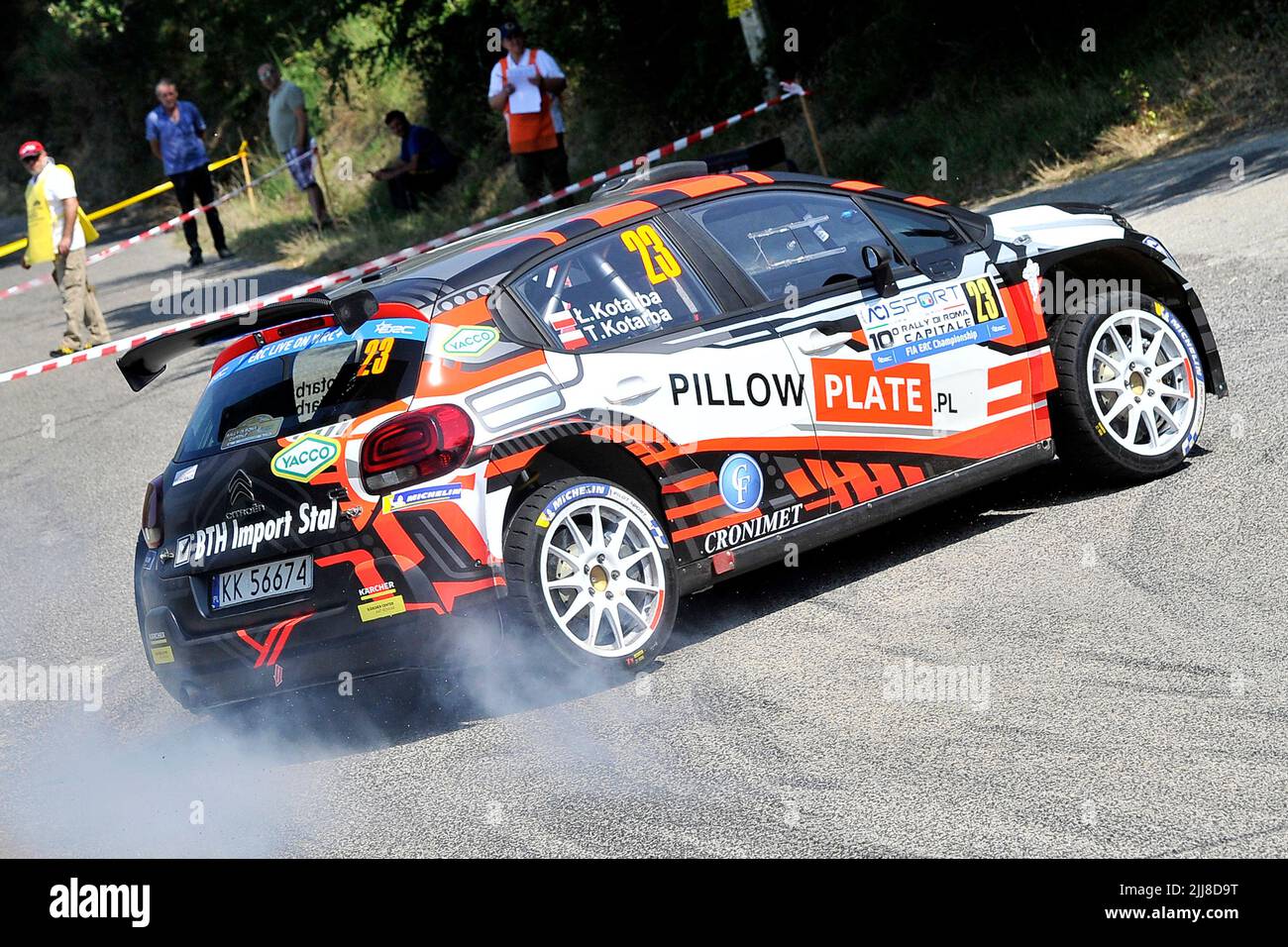 The Driver Lukasz Kotarba And His Co-driver Adrian Perez Aboard Their 