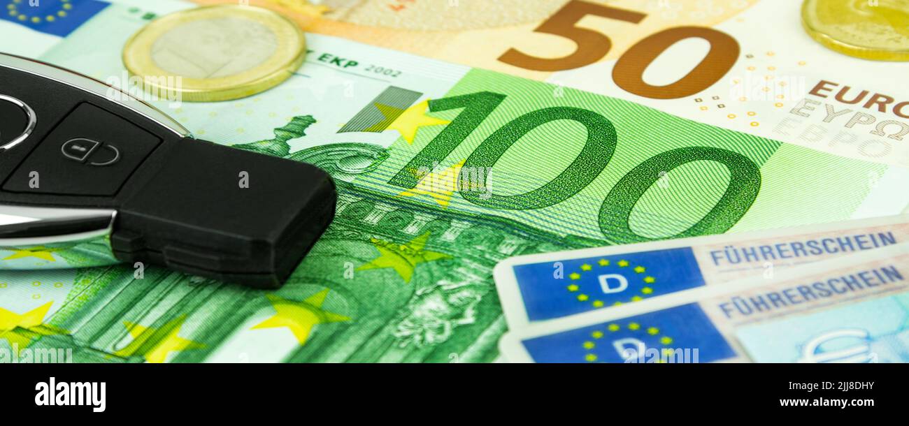 Kosten für Energie und Verkehr mit Führerschein, Autoschlüssel und Euro Stock Photo