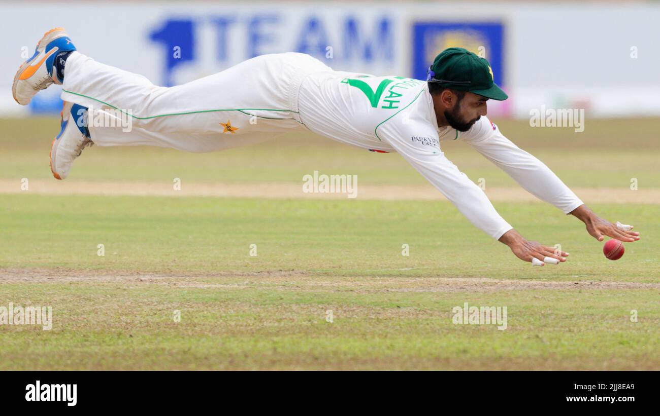 Galle, Sri Lanka. 24th July 2022. Pakistan's Abdullah Shafique dives to