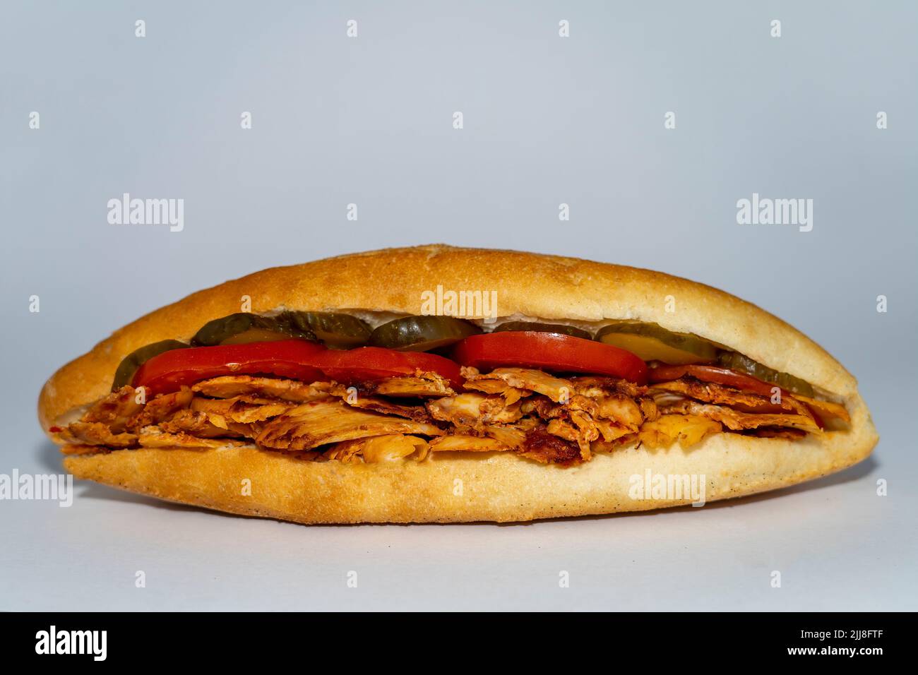 Long Döner chicken sandwich or Sandviç döner Isoläted on white ...